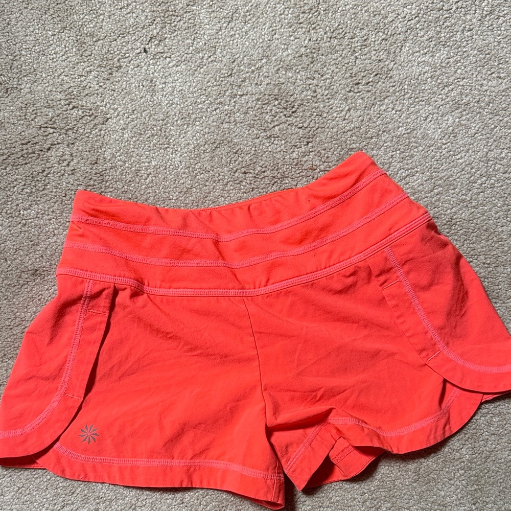 Athleta Bright Orange Athletic Shorts xxs